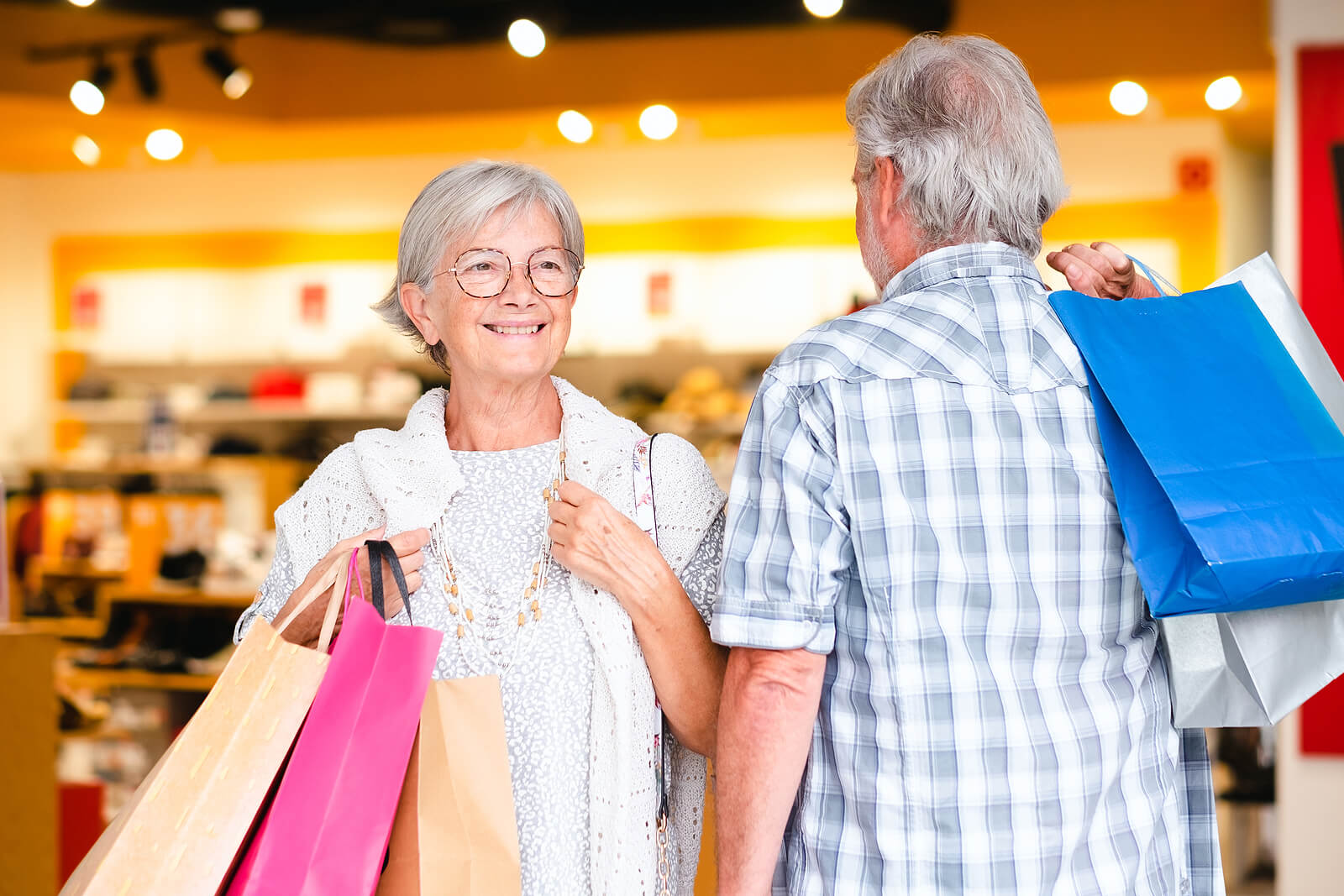 bigstock-Happy-Senior-Couple-Carrying-S-458223329 (1)