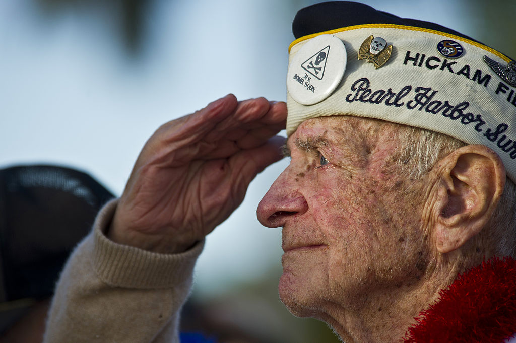 photo of an elderly veteran saluting
